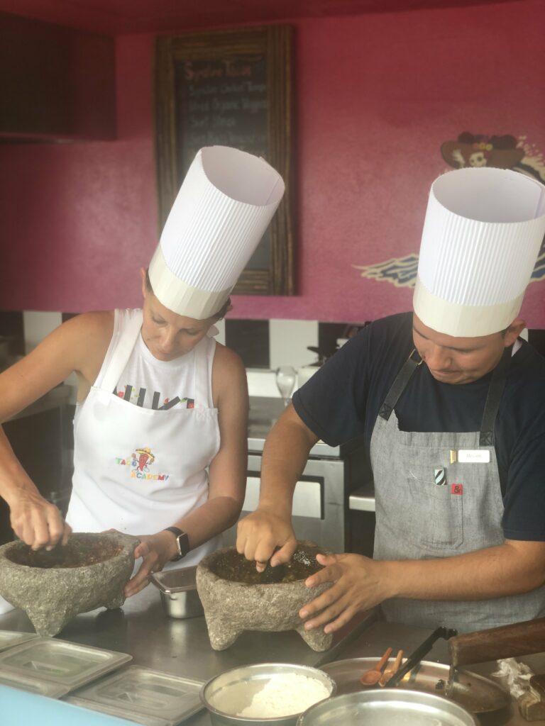 Chef Ben and I grinding ingredients. No food processor here…hand grinding in a molcajete
