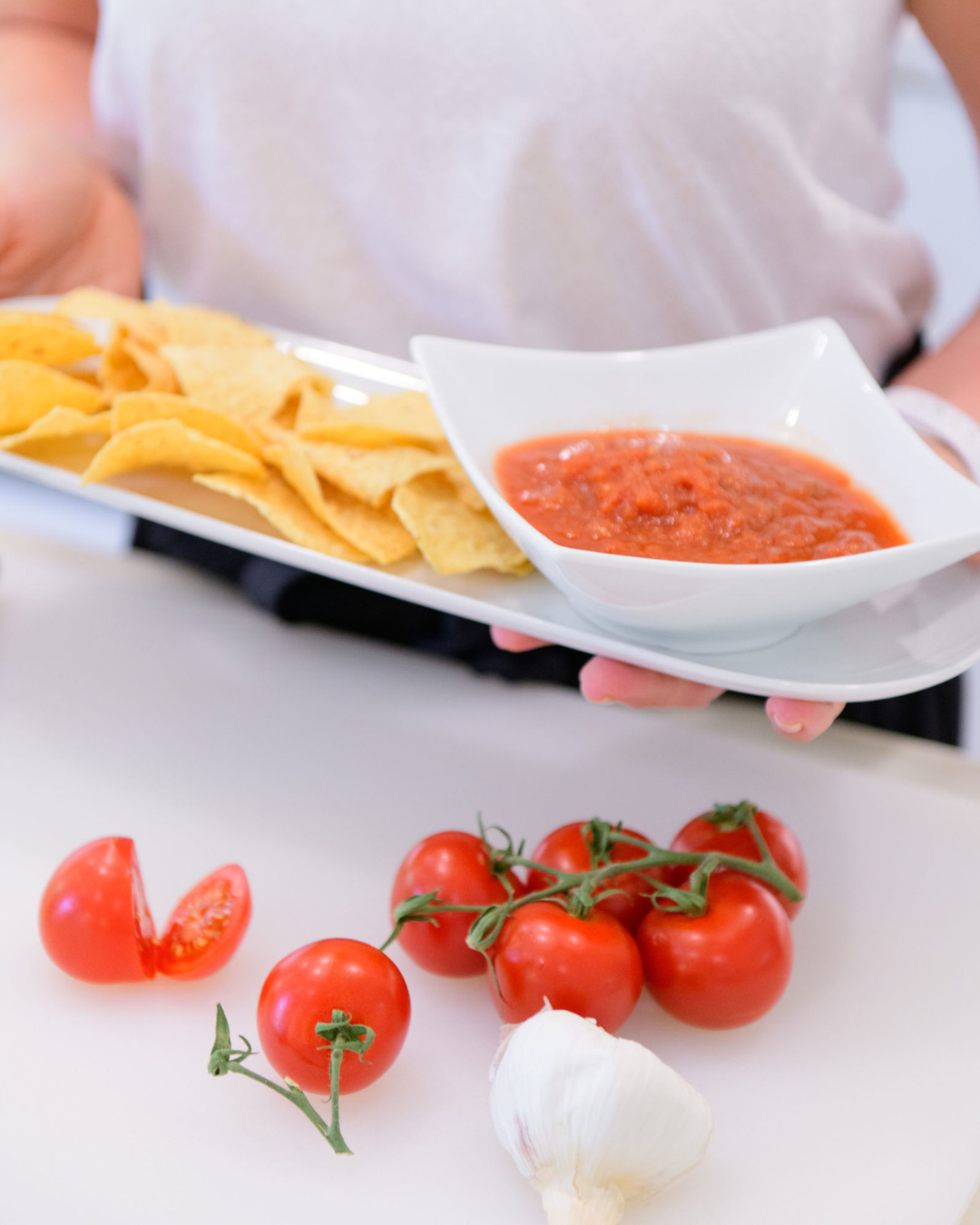 fresh homemade salsa, tomatos, garlic clove, limes