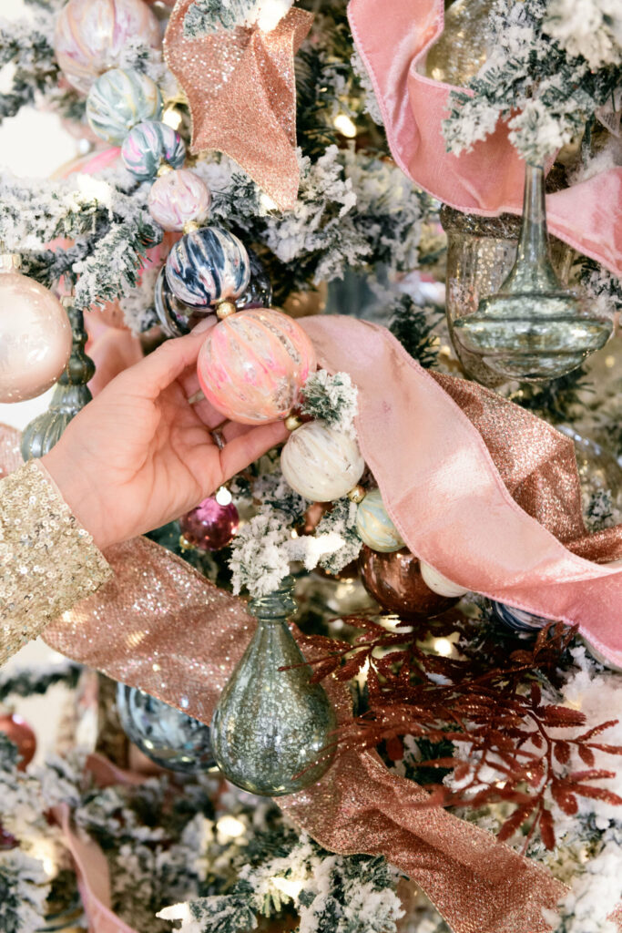 Festive home decor with shades of blue, pink, and more pastel ornaments